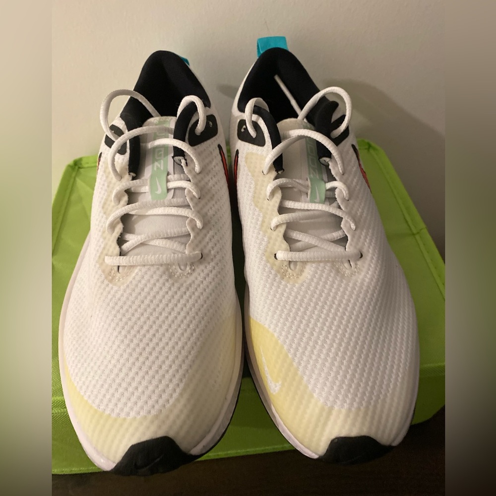 New Kids shoes size 5 . Unisex . Box was broken during delivery from inventory .